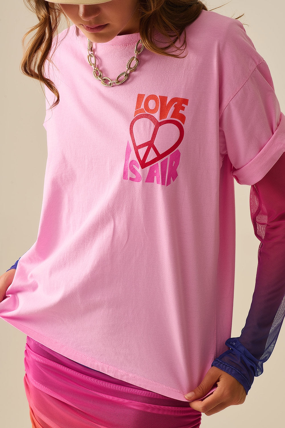 T-Shirt rose avec le logo Love is Air et Heart with Peace