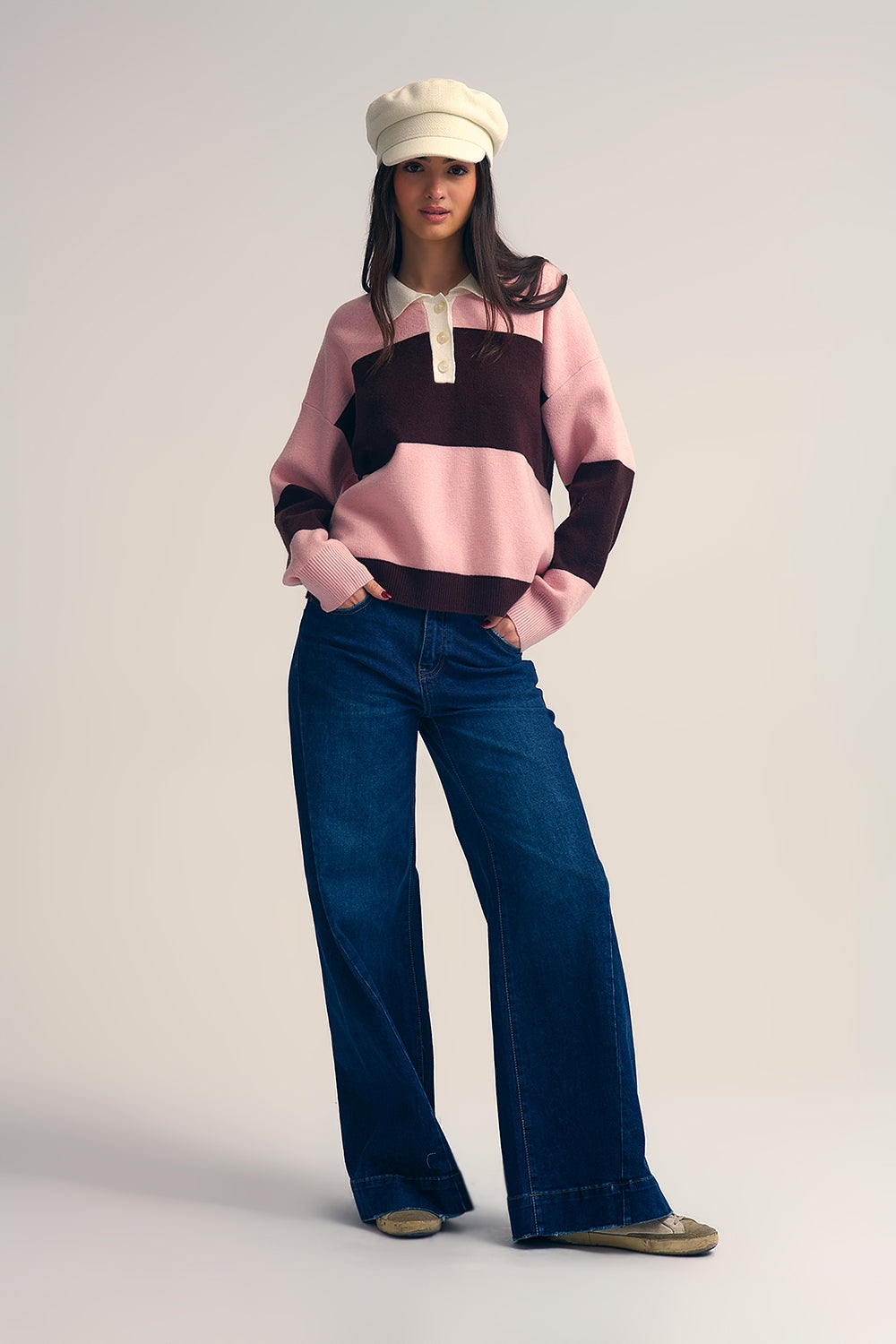 Pull polo en tricot rose à rayures marron